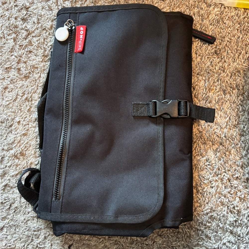 Skip Hop Black Toiletry Bag with Red Tag